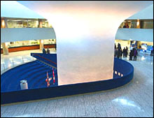 Rotunda of the Toronto City Hall: "Visitors entering City Hall from Nathan Phillips Square walk directly into a large and distinctive rotunda."