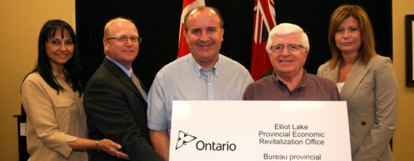 On hand for the Ontario funding announcement were, from left: Joyce Cyr, President of the Elliot Lake Chamber of Commerce, William Elliott, General Manager of ELNOS, the Elliot Lake and North Shore Corporation for Business Development, Mayor Rick Hamilton, Northern Development and Mines Minister and NOHFC Chair Rick Bartolucci, and local NOHFC board member Marielle Brown.