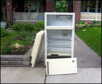 City of Toronto's image: Damaged refrigerator at the curb.